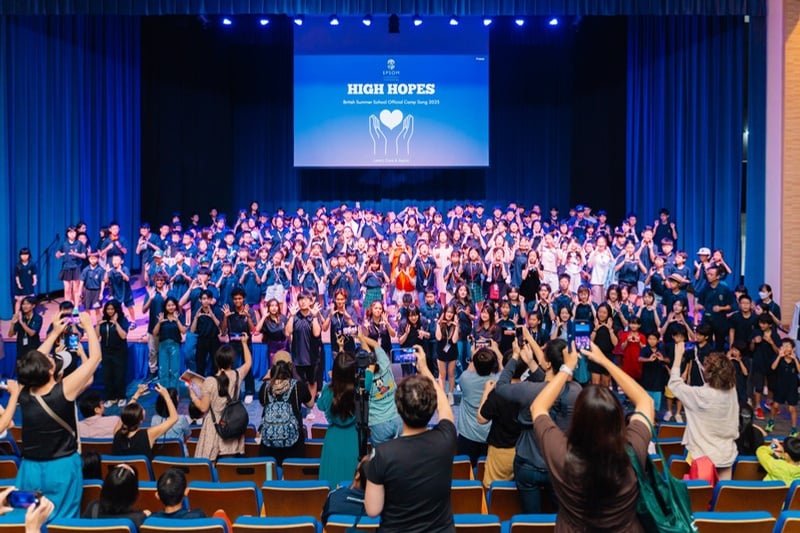 Campers and families celebrating on stage at the end-of-camp show at Epsom College MalaysiaThe buildings of Epsom College Malaysia in Bandar Enstek