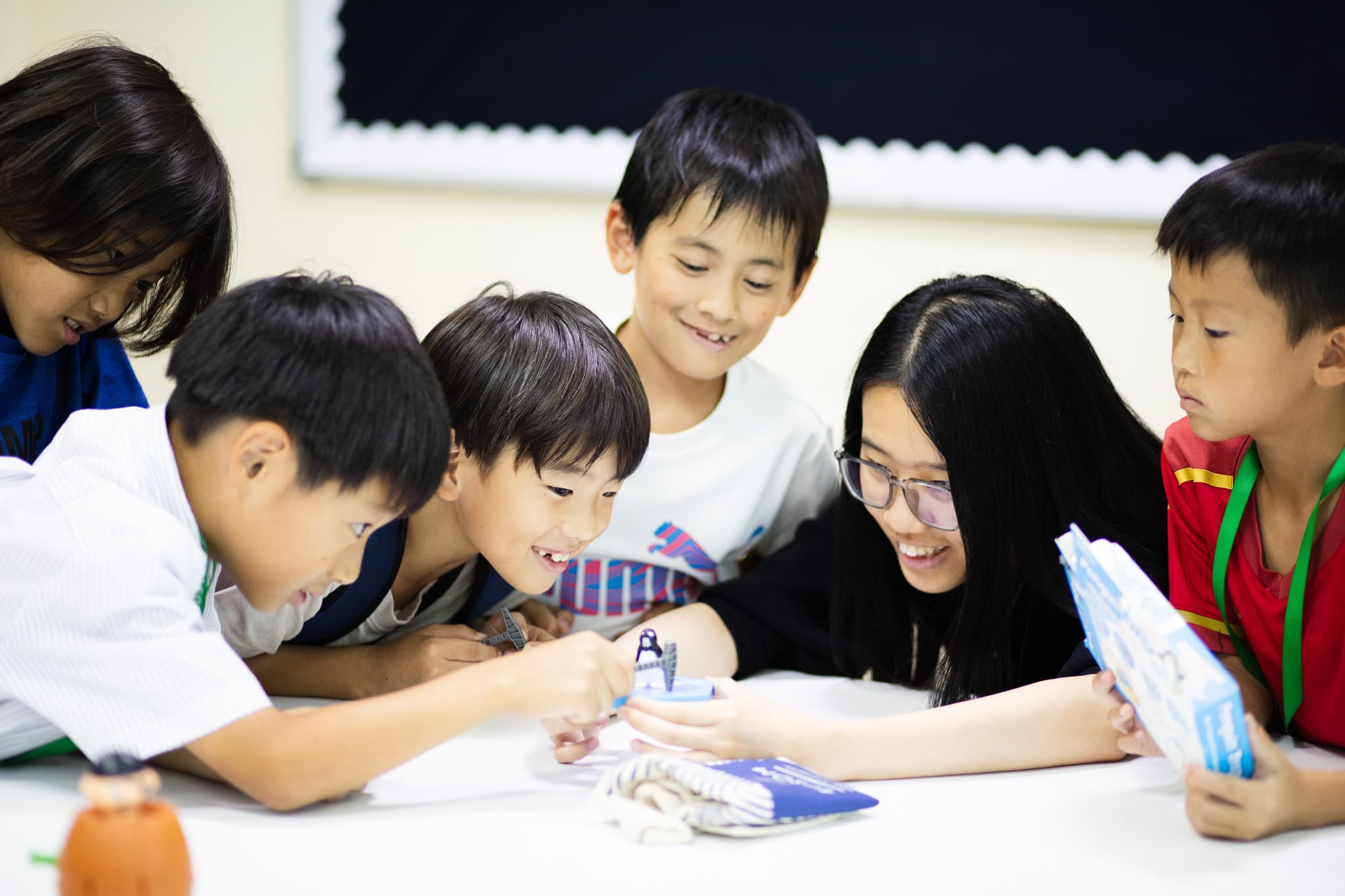 Campers doing a hands-on science experiment in an Exploratory Afternoon