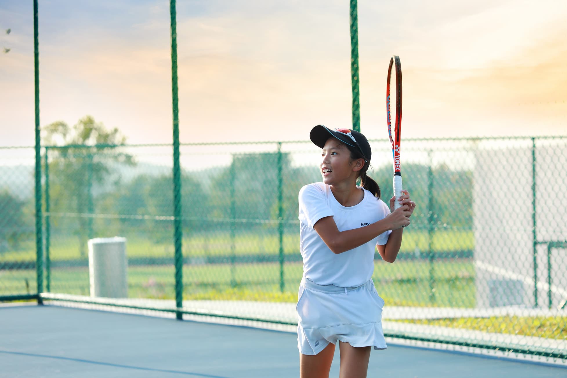 A camper training in tennis with Mouratoglou Academy Malaysia