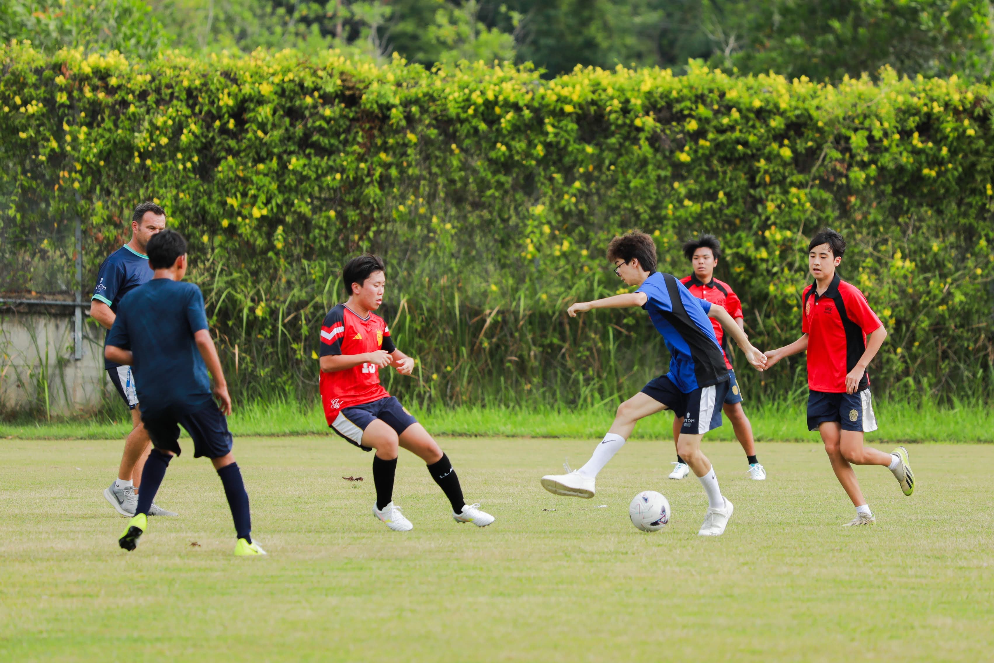 Students in a house competition soccer match